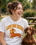 Woman wearing the Long Dog Energy dachshund t-shirt outdoors with her dachshund